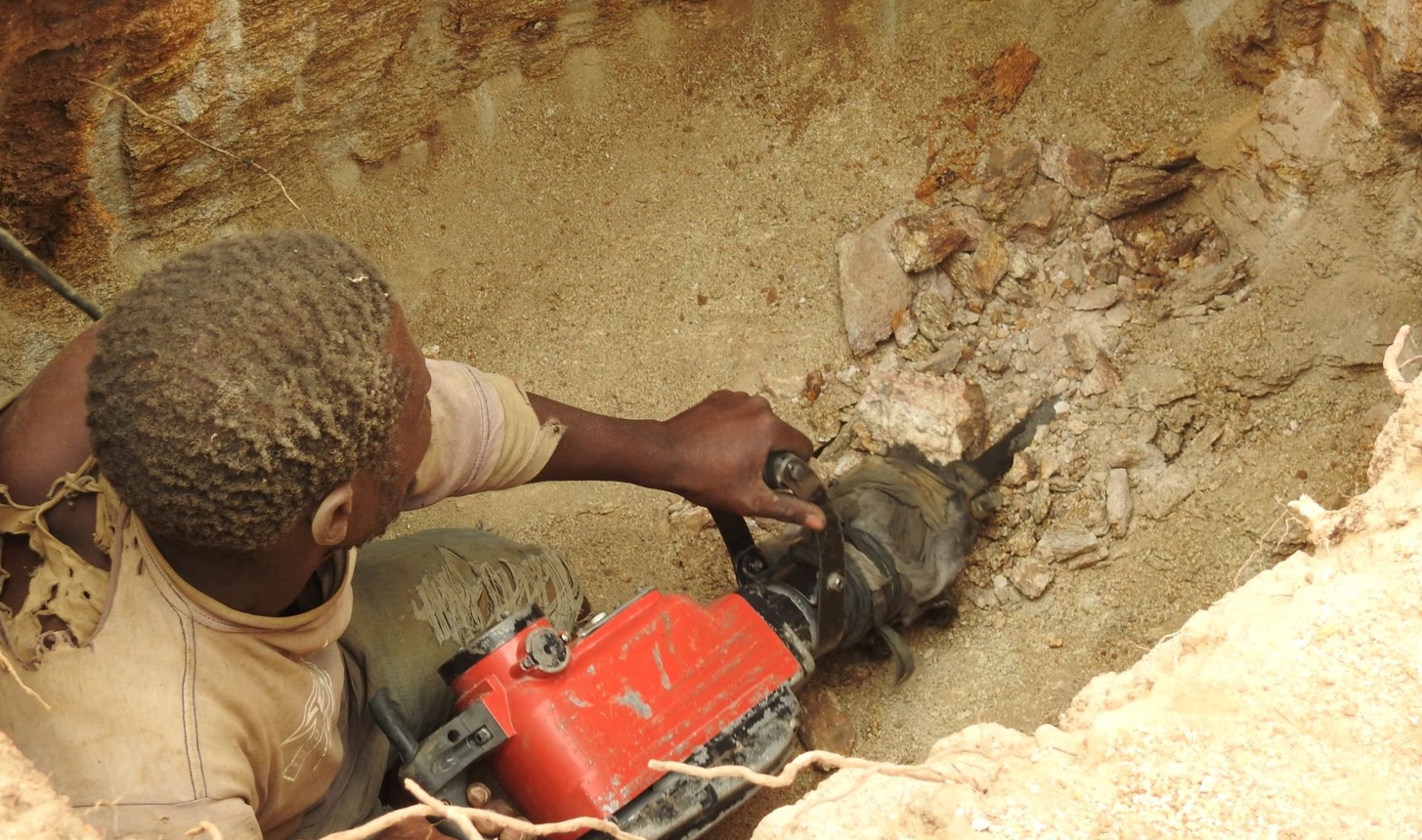 a man using a drill